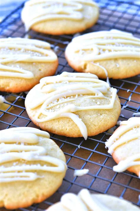 lemon-sugar-cookies-with-white-chocolate-drizzle image