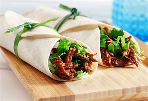 slow-cooked-asian-spiced-pulled-pork-wraps image