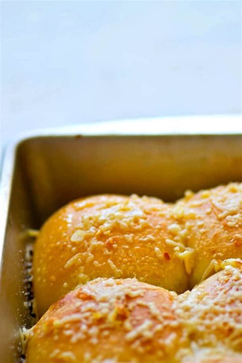 roasted-garlic-asiago-cornmeal-dinner-rolls-whole image