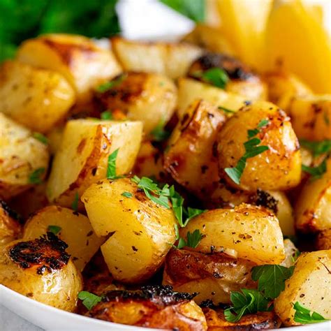 slow-roasted-greek-lemon-potatoes-sprinkles-and image
