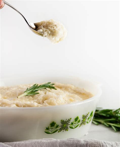 mascarpone-mashed-potatoes-with-rosemary-butter image