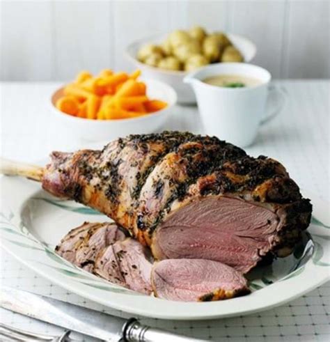 roast-leg-of-lamb-with-tarragon-and-mint-butter image