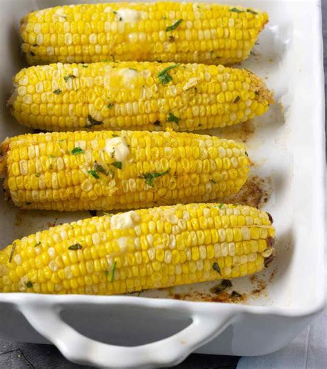 vegan-baked-corn-with-herb-butter-healthier-steps image
