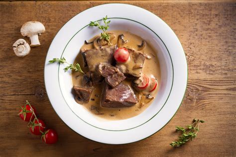 braised-beef-cheek-with-mushrooms-and-coffee image