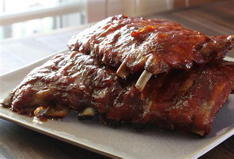 baby-back-ribs-with-peach-barbecue-sauce image