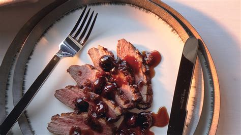 seared-duck-breast-with-cherries-and-port-sauce image