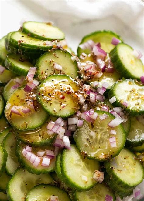 cucumber-salad-with-herb-garlic-vinaigrette-recipetin image