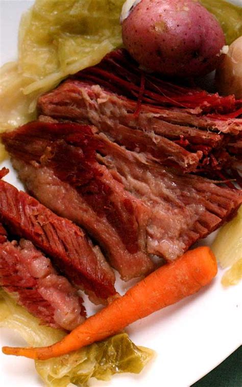 homemade-corned-beef-with-vegetables-recipe-flavorite image