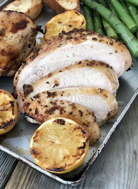 grilled-lemon-rosemary-bone-in-chicken-breasts image