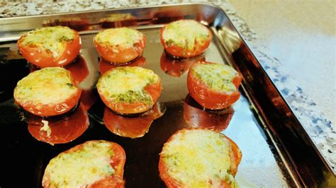 effortless-broiled-tomatoes-with-pesto-and-parmesan image