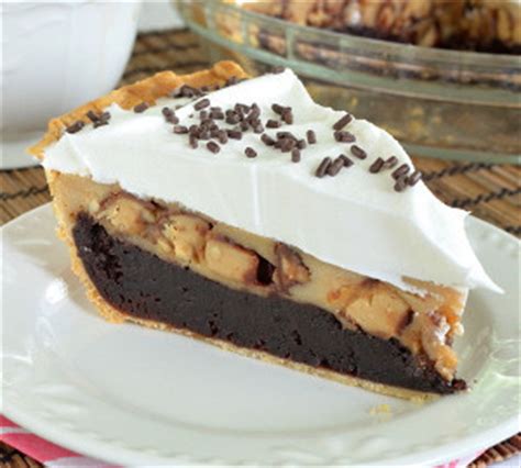 peanut-butter-snickers-cheesecake-brownie-pie image