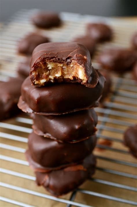 chocolate-covered-caramel-coconut-bars-blissful image
