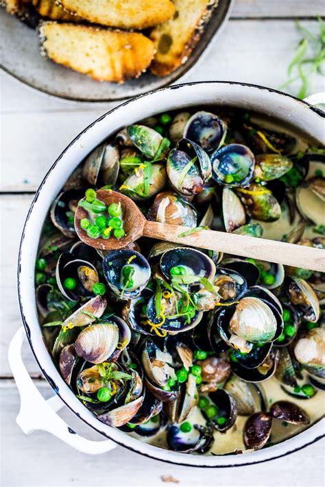 steamed-clams-in-tarragon-white-wine-broth image