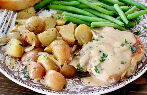 instant-pot-smothered-pork-chops-and-little-potatoes image