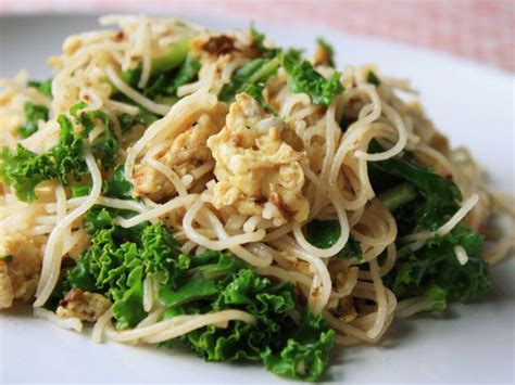 stir-fried-rice-noodles-with-eggs-and-greens image