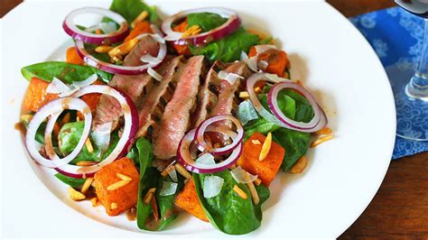flank-steak-spinach-salad-recipe-tablespooncom image