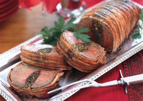 bacon-wrapped-beef-tenderloin-with-herb-stuffing image