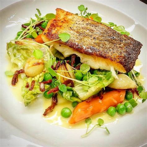 fried-salmon-braised-little-gems-peas-with-summer image
