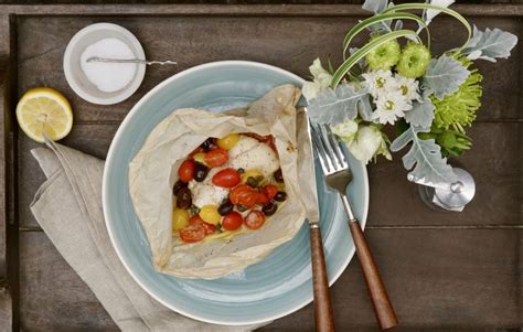 sole-en-papillote-with-tomatoes-capers-and-olives image