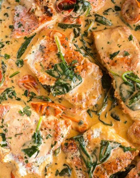pan-seared-salmon-with-creamy-spinach-and-tomatoes image