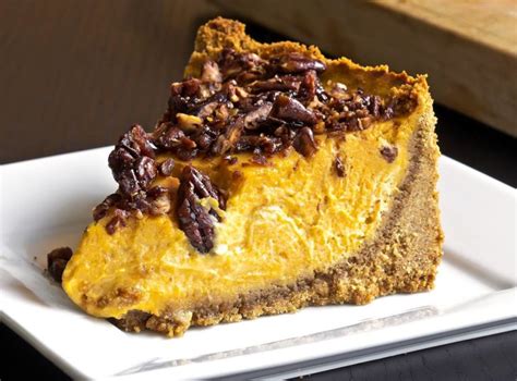 pumpkin-cheesecake-with-caramelized-pecan-topping image