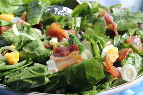 spinach-bacon-salad-with-lemon-garlic-dressing-a image