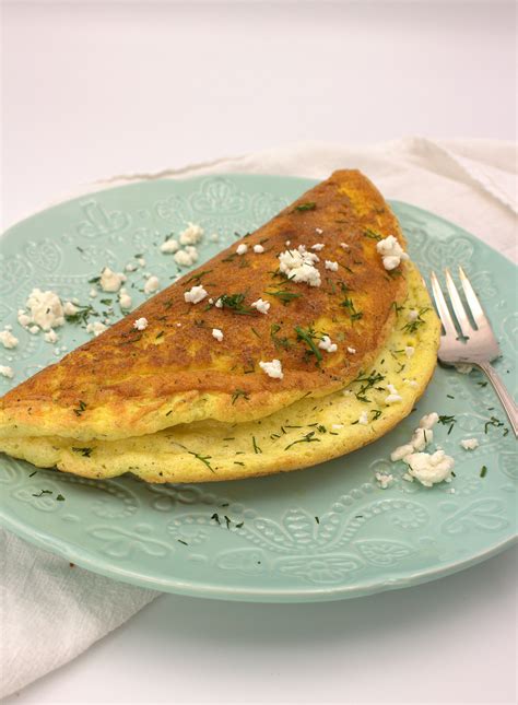 puffy-herb-omelet-with-chevre-palatable-pastime image