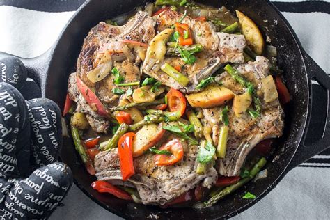 cast-iron-skillet-pork-chops-with-veggies-and-apples image