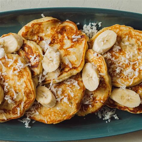 coconut-banana-pancakes-spoon-fork-bacon image