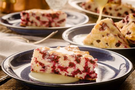 wild-cranberry-cake-warm-butter-sauce-blueberries image