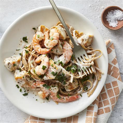 chicken-shrimp-alfredo-recipe-eatingwell image