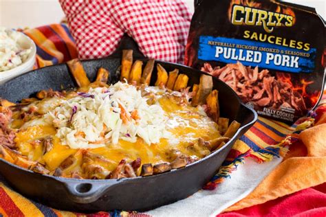 curlys-pulled-pork-loaded-sweet-potato-fries-parade image