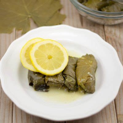 dolmathes-greek-stuffed-grape-leaves-lemon image