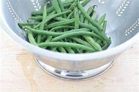 easy-and-delicious-seasoned-green-beans-julie-blanner image