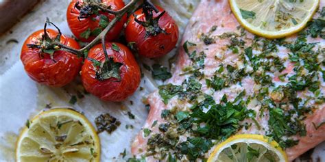 garlic-and-herb-roasted-salmon-and-tomatoes-delish image