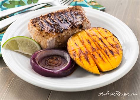 grilled-jerk-pork-chops-with-mango-and-rum-sauce image