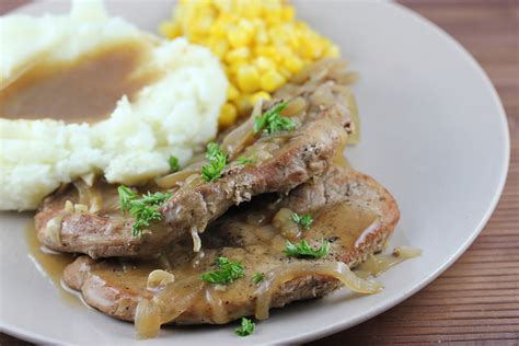slow-cooker-smothered-pork-chops-recipe-cullys-kitchen image