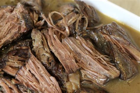 slow-cooker-herb-pot-roast-recipe-juicy-fork-tender image