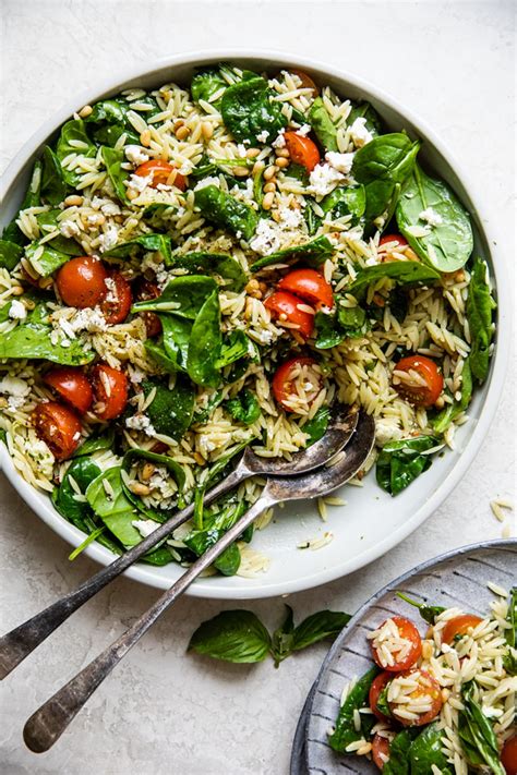 spinach-orzo-salad-with-feta-tomatoes-and-a-basil image