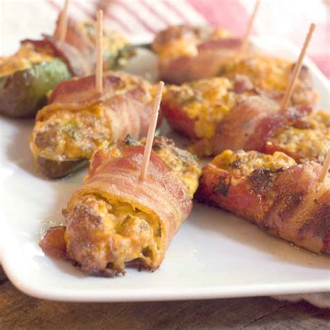 sausage-stuffed-bacon-wrapped-jalapenos-lanas image