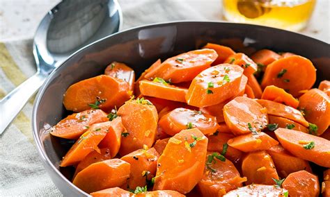 honey-citrus-glazed-carrots-food-channel image