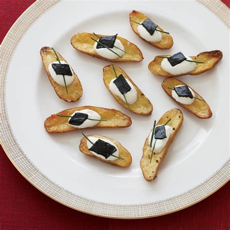 roasted-fingerling-potato-and-pressed-caviar-canaps image