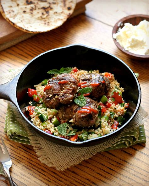 lamb-merguez-patties-and-couscous-salad-tastefood image