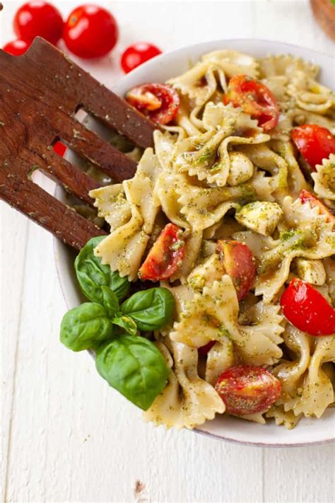 caprese-pasta-salad-with-pesto-the-foodie-dietitian image