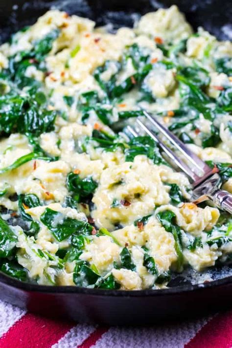 cheesy-scrambled-eggs-with-spinach-noshing-with-the image