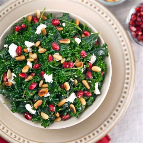 kale-salad-with-pine-nuts-and-pomegranate-in-search image