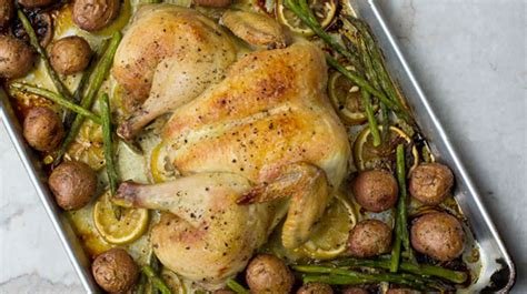 spatchcock-chicken-with-potatoes-asparagus-and-lemon image