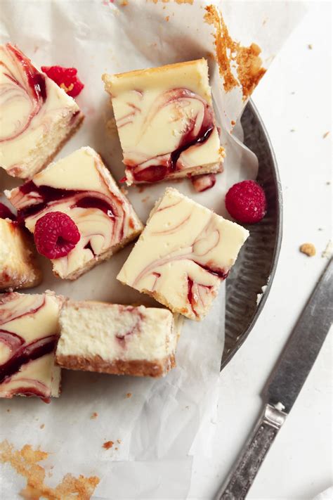 white-chocolate-raspberry-cheesecake-bars-broma-bakery image