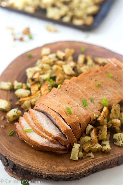mesquite-pork-loin-with-parmesan-roasted-potatoes image