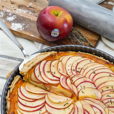 savory-tart-with-apples-cheddar-and-onion-couple-in image